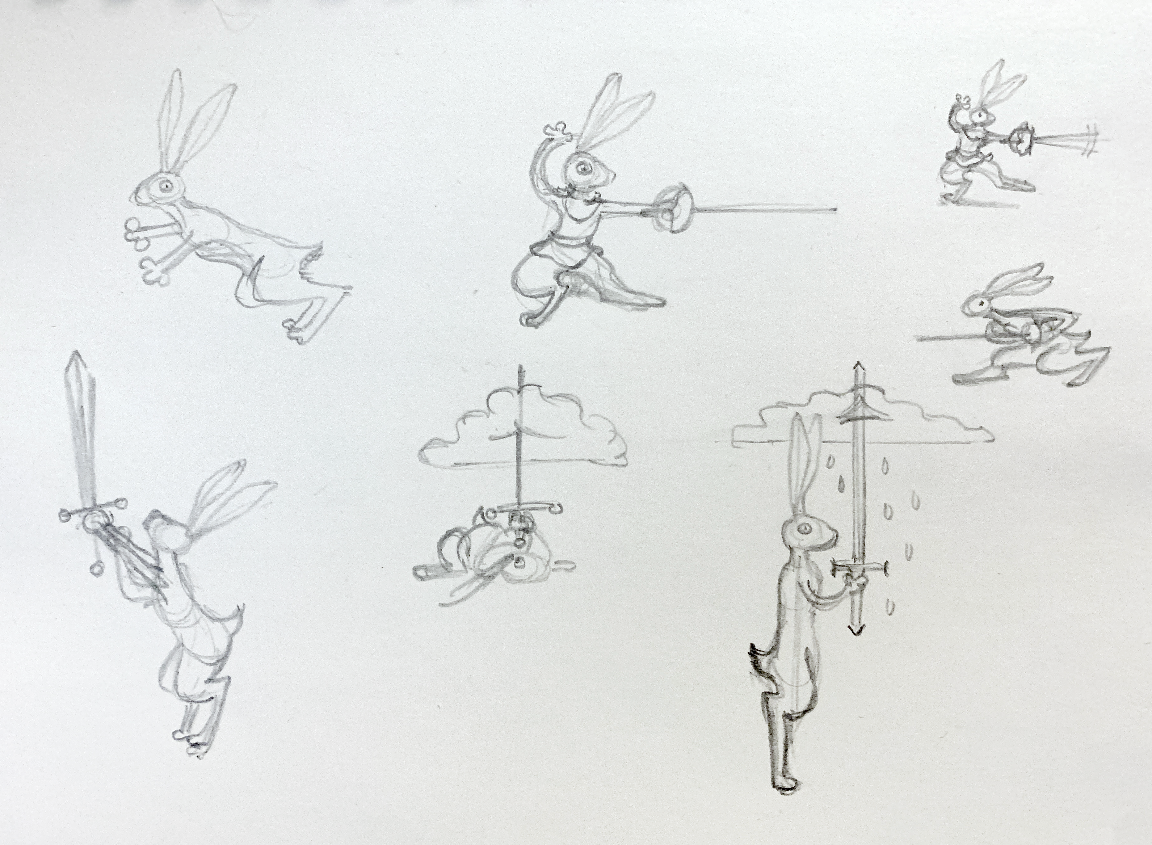 Several idea sketches for a medieval scroll design, with cartoonish rabbits brandishing swords and rapiers