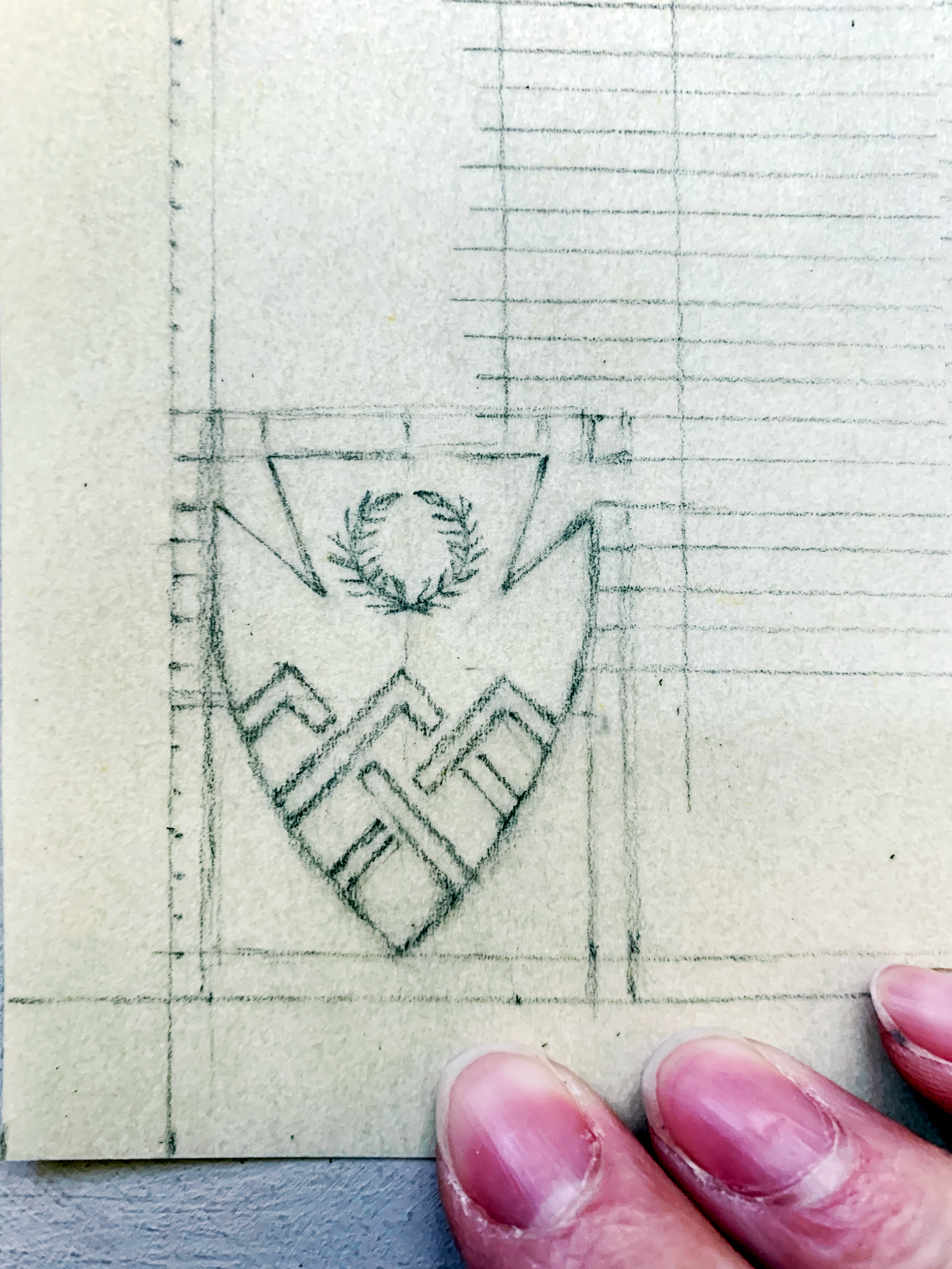 A medieval scroll award in progress: the pencil stage, close-up of another shield device, shaped like an arrowhead